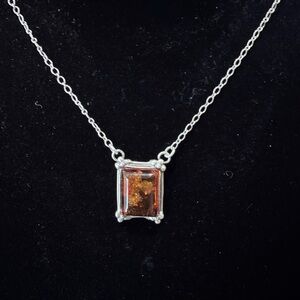 Elegant Silver Necklace with Amber Pendant